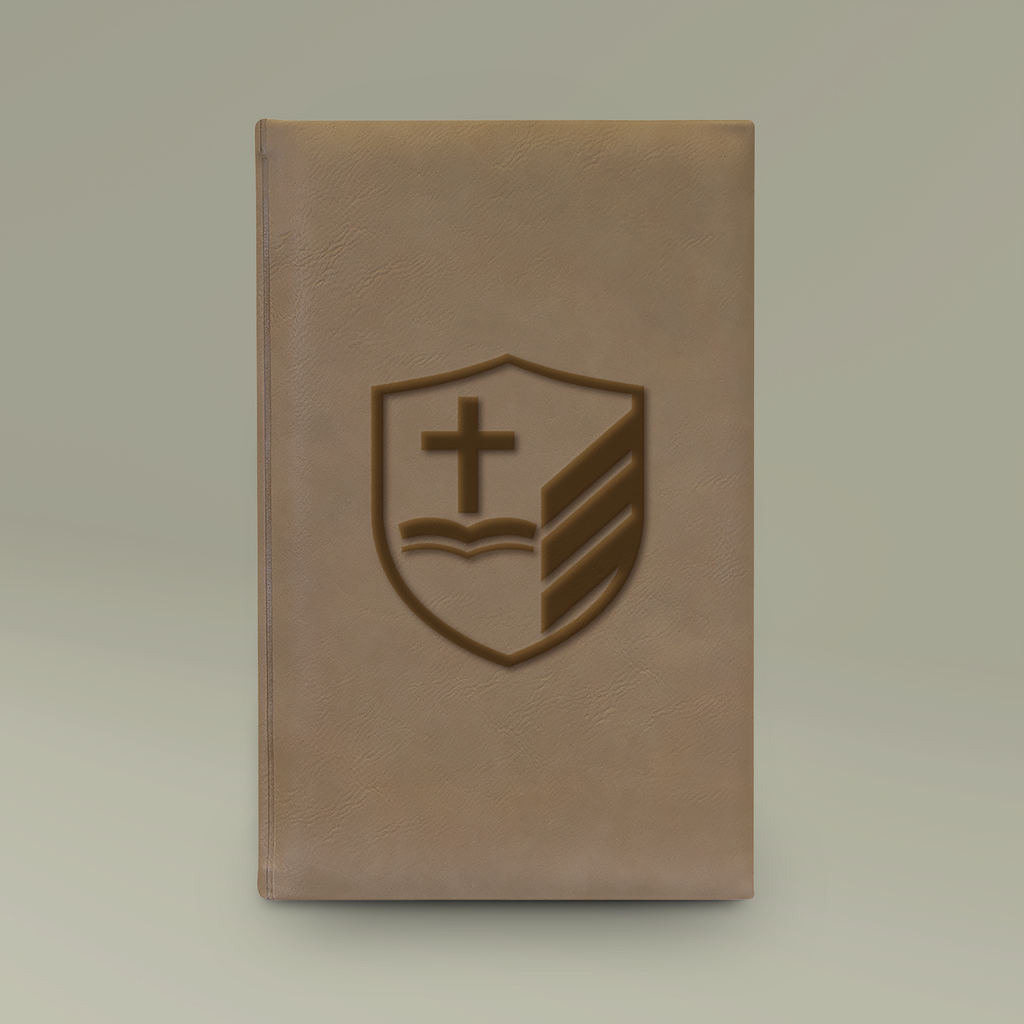 Wright Legacy Solutions leather journal with gold-engraved shield emblem