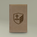 Wright Legacy Solutions leather journal with gold-engraved shield emblem